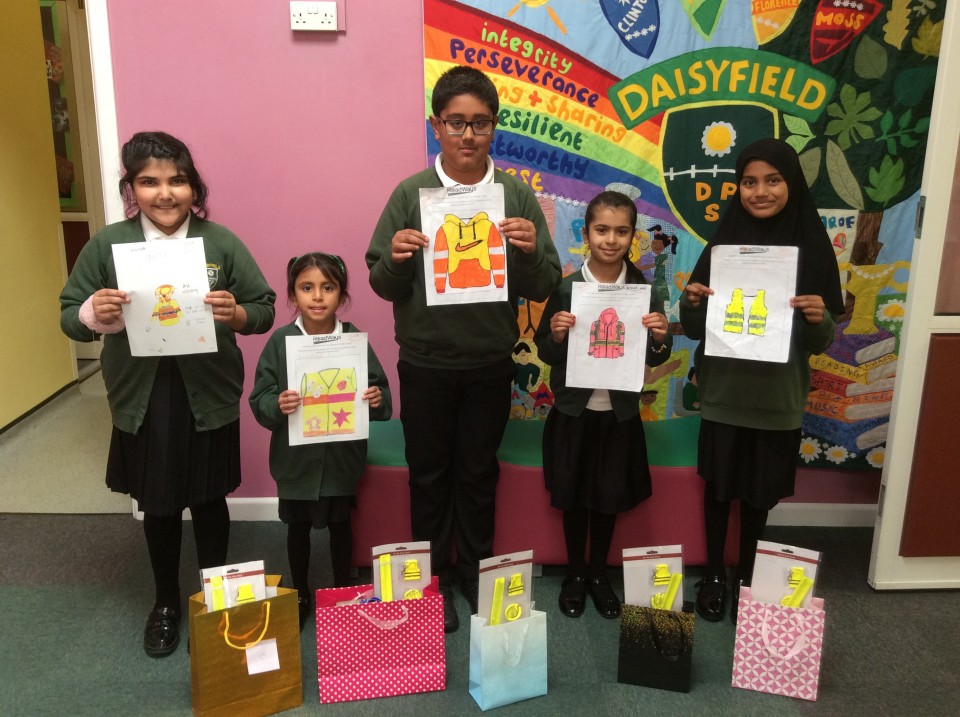 Winners from Daisyfield Primary School with their Be Bright Be Seen posters