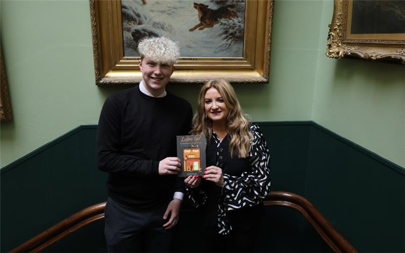 Brayden and Christina with the Listen Up! book.