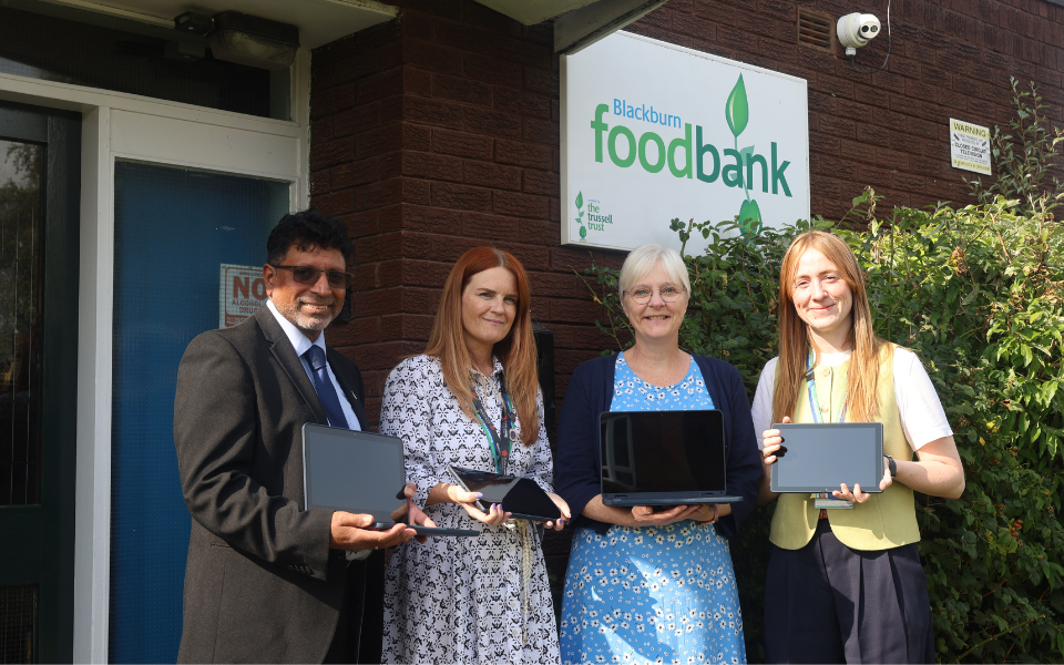 Laptop donation to foodbank
