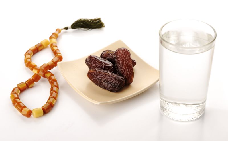 Prayer beads, figs and water image