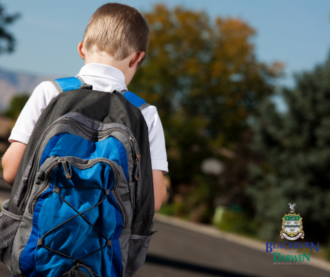 Boy walks to school