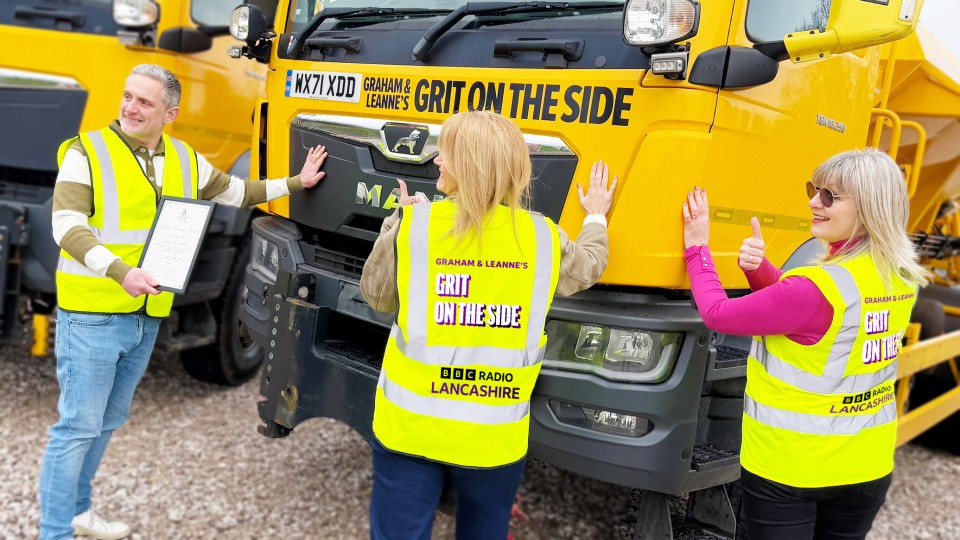 BBC Radio Lancashire presenters with their new gritter, Grit on the Side and Cllr Julie Gunn giving it the thumbs up!